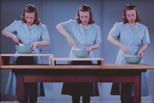 A woman trying different height workspaces in the kitchen