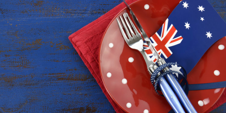 knife and fork and australian flag on a plate
