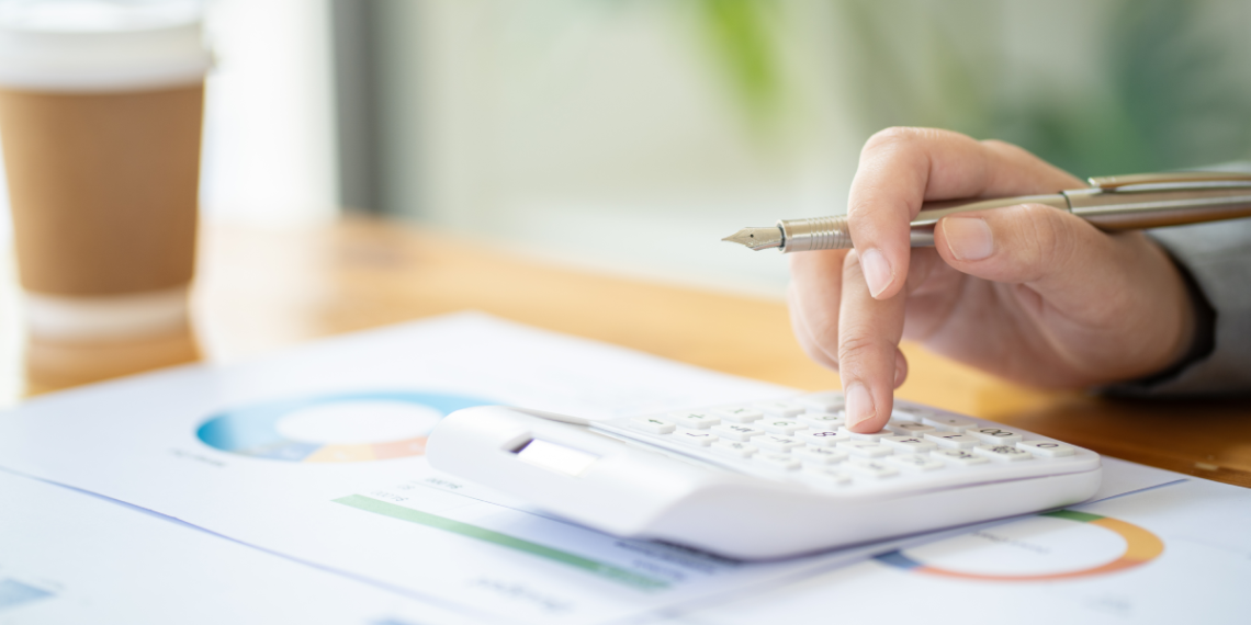 Discovering Cost-Saving Habits: Energy-Efficient Practices for Lower Electricity Bills Banner Image - Calculating Cost Economic budget saving and investment concept analyzing investment charts