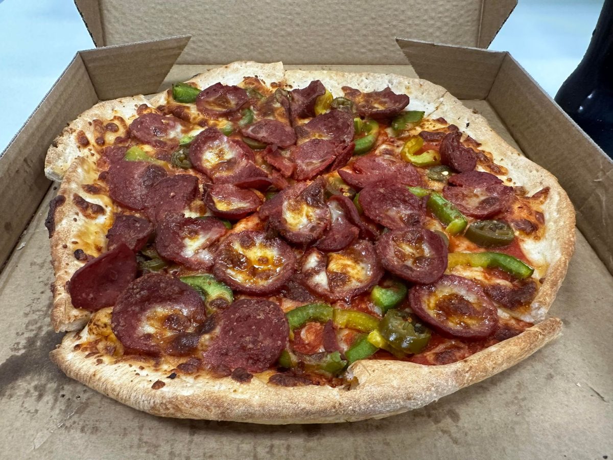 Mexicana pizza with tomato base, capsicum, jalapenos and pepperoni