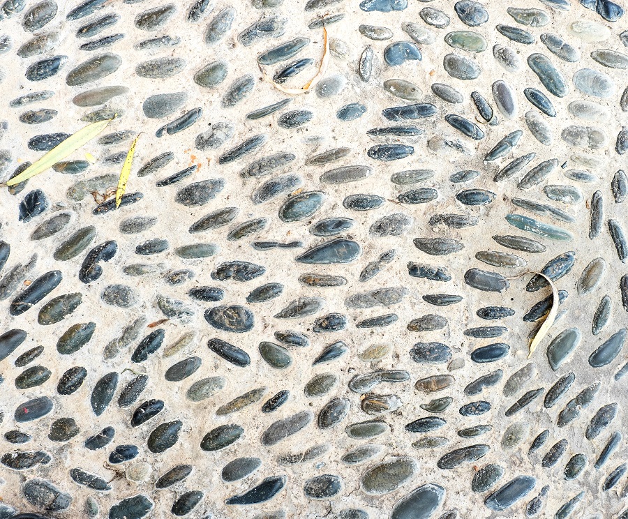Pebble in concrete floor, texture background.