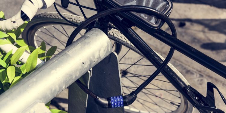 Metal lock on a bike wheel