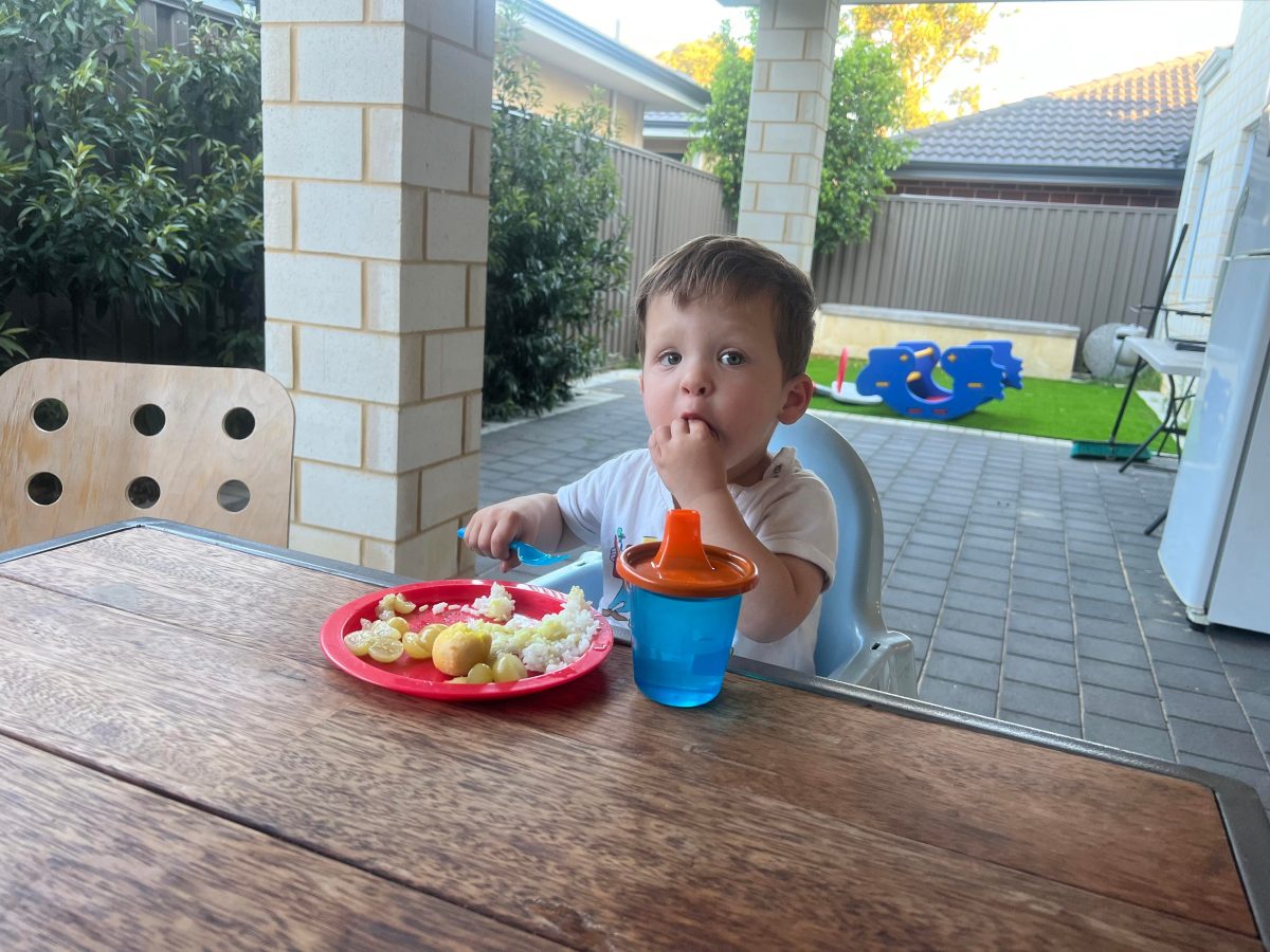 charlie eating dinner outside in perth