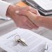 Handshake between estate agent and customer