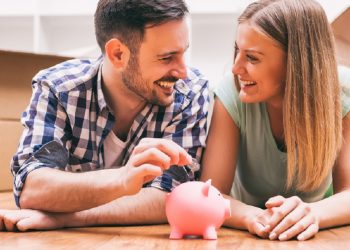 young couple saving money for new home
