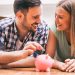 young couple saving money for new home