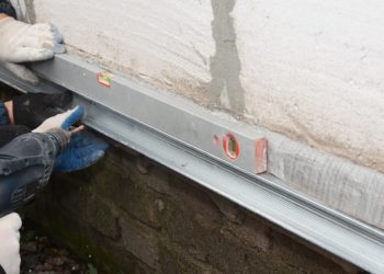 Old house foundation wall repair and renovation with installing