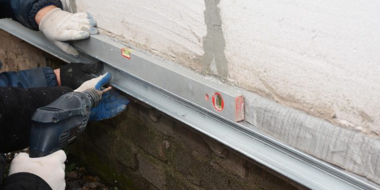 Old house foundation wall repair and renovation with installing