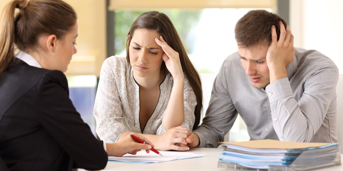 frustrated people with real estate agent