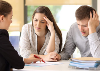 frustrated people with real estate agent