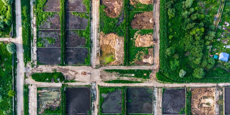 Silt pits next to the city's wastewater treatment plant, viewed from a high altitude