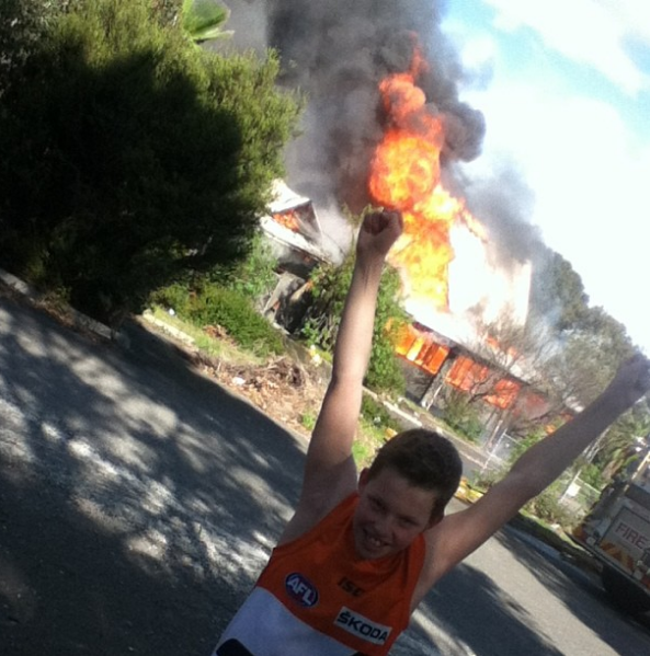 kid out the front of bundoora smorgys on fire