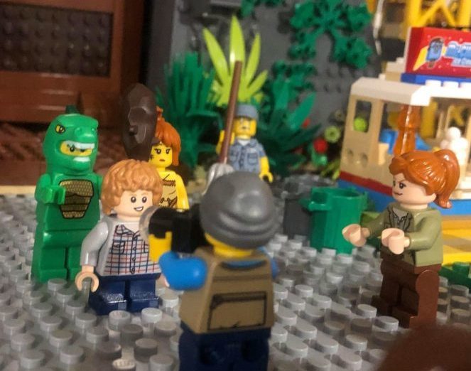 lego jurassic world dioarama with dinosaur man costume