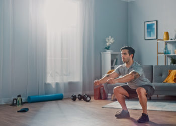 man exercising at home