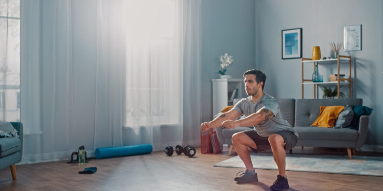 man exercising at home