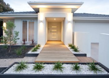 Facade and entry to a contemporary white rendered home in Australia