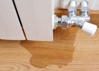water spilling out of wall